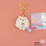 San-X Sumikko Gurashi Schlüsselanhänger Stofftiermaskottchen Eisbär Shirokuma Weiß Schmuckstein Karabinerhaken Sternenform Gold Japan Kawaii Magical hanging stuffed toy (polar bear)