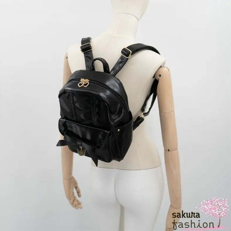 axes femme POETIQUE Kunstlederrucksack Schwarz Mittelgroß Spitze Schnürung Schleife Sanrio Kuromi Metallanhänger Gold Japan Kawaii Feminin kuromi bagpack with charm