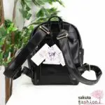 axes femme POETIQUE Kunstlederrucksack Schwarz Mittelgroß Spitze Schnürung Schleife Sanrio Kuromi Metallanhänger Gold Japan Kawaii Feminin kuromi bagpack with charm