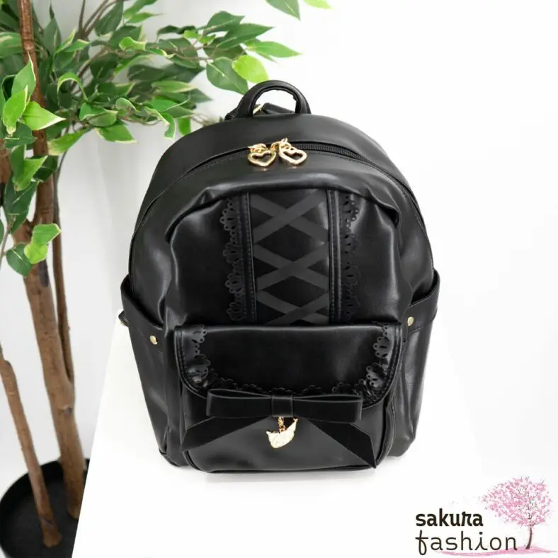 axes femme POETIQUE Kunstlederrucksack Schwarz Mittelgroß Spitze Schnürung Schleife Sanrio Kuromi Metallanhänger Gold Japan Kawaii Feminin kuromi bagpack with charm
